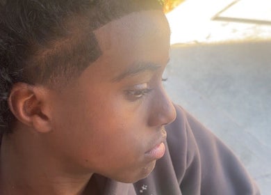 Side view of a fresh fade haircut at Abodiblendzz, St. Catharines, Ontario, CA, showcasing expertise and style.