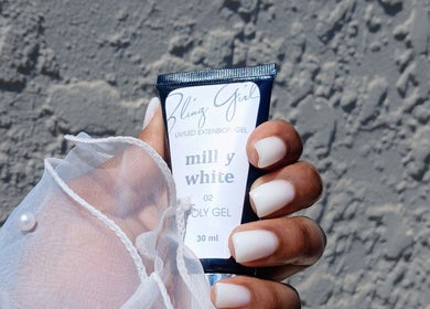 Elegant hand holding white poly gel at Leko Nails, Midrand, Gauteng, ZA. Perfect for stylish manicures.