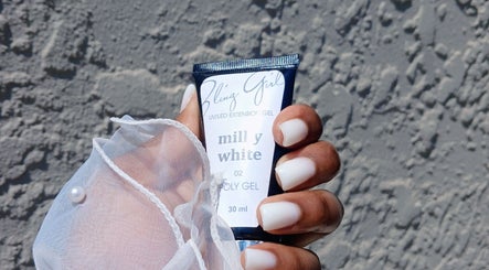 Elegant hand holding white poly gel at Leko Nails, Midrand, Gauteng, ZA. Perfect for stylish manicures.