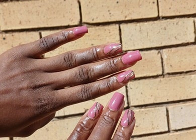 Stylish pink nails with gold accents at Leko Nails, Midrand, Gauteng, ZA.