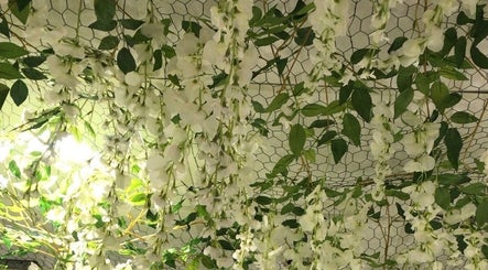 Elegant floral canopy at Willow Mane Hair Garden in Dapto, New South Wales, AU.