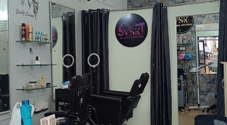 VSK Beauty Parlour's chic interior in Puducherry, IN, featuring modern styling chairs and beauty products.