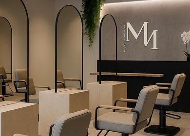 Interior of SABROWS | Luxury Brow Bar in Montréal, Québec, CA, featuring chic chairs and stylish decor.