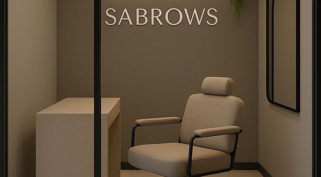 Modern interior of SABROWS | Luxury Brow Bar in Montréal, Québec, CA featuring sleek aesthetics and comfortable seating.