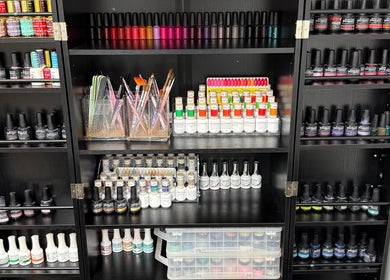 Colorful nail polish display at The B.A. Beauty Co. in Rifle, Colorado, US. Vibrant hues and polish tools.