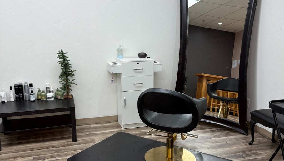 Modern salon chair and mirror at The B.A. Beauty Co., Rifle, Colorado, US.