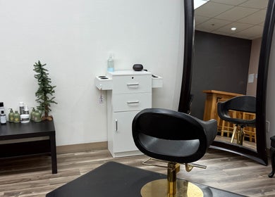 Modern salon chair and mirror at The B.A. Beauty Co., Rifle, Colorado, US.