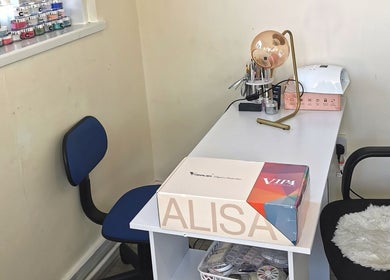 Cozy nail station at Princess Nails Swansea, Swansea, Wales, GB showcasing tools and products.