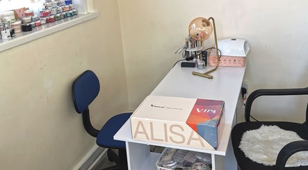 Cozy nail station at Princess Nails Swansea, Swansea, Wales, GB showcasing tools and products.