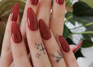 Elegant red stiletto nails at Princess Nails Swansea, Swansea, Wales, GB.