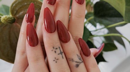 Elegant red stiletto nails at Princess Nails Swansea, Swansea, Wales, GB.