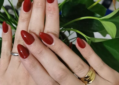 Elegant red nails from Princess Nails Swansea in Swansea, Wales, GB, showcasing chic nail artistry.