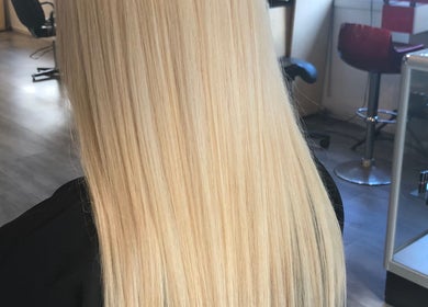 Sleek blonde hair styling at Abstract Khem | Stephanie White, San Diego, California, US.