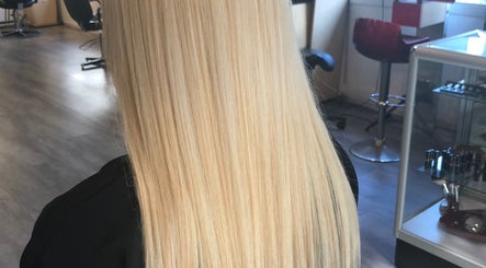 Sleek blonde hair styling at Abstract Khem | Stephanie White, San Diego, California, US.