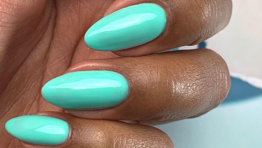 Aqua gel nails at Beauty Studio Curaçao, Willemstad, CW. Perfectly manicured fingers in a fresh turquoise hue.