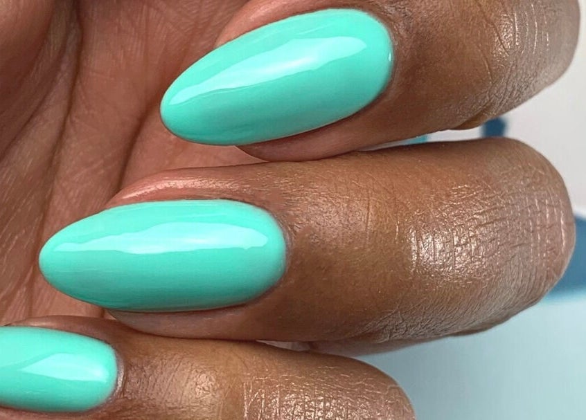 Aqua gel nails at Beauty Studio Curaçao, Willemstad, CW. Perfectly manicured fingers in a fresh turquoise hue.