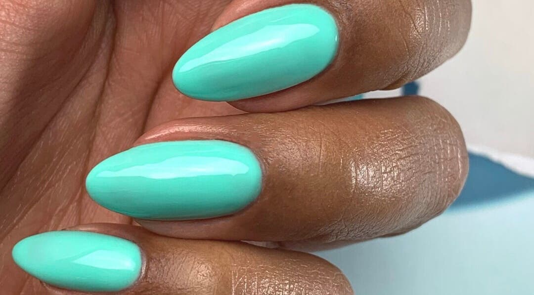 Aqua gel nails at Beauty Studio Curaçao, Willemstad, CW. Perfectly manicured fingers in a fresh turquoise hue.