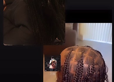 Intricate braided hairstyle at IcedbyN, Fort Myers, Florida, US, showcasing precision and style.