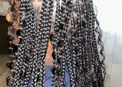 Detailed view of stylish braided hair at IcedbyN in Fort Myers, Florida, US.