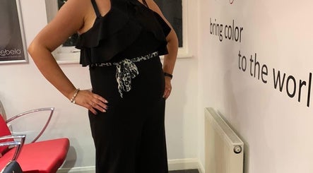 Stylish salon interior at Hair by Emma, Portlethen, Scotland, GB with modern seating and elegant decor.