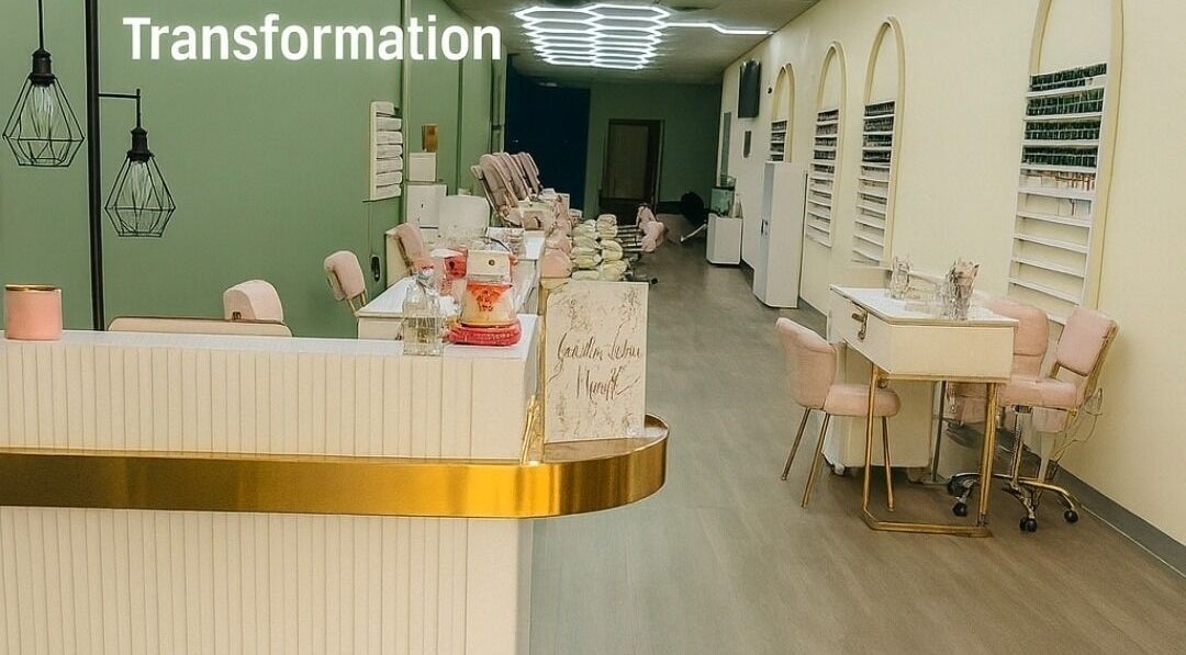 Elegant salon interior of Golden Lotus Nails, New Britain, Connecticut, US, featuring plush pink seating.