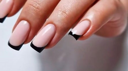 Chic black French manicure at Golden Lotus Nails, New Britain, Connecticut, US.