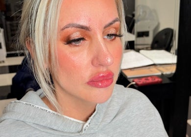 Woman with elegant makeup at Mieroi Beauty in Wigan, England, GB, showcasing expert beauty services.