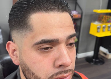 Close-up of a fresh, sleek fade haircut at JYSBARBER.PRO, Yonkers, New York, US.