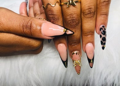 Stylish nail art with black and gold at Nailed by Mandy, Katlehong, Gauteng, ZA.