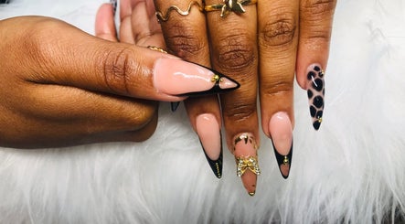 Stylish nail art with black and gold at Nailed by Mandy, Katlehong, Gauteng, ZA.
