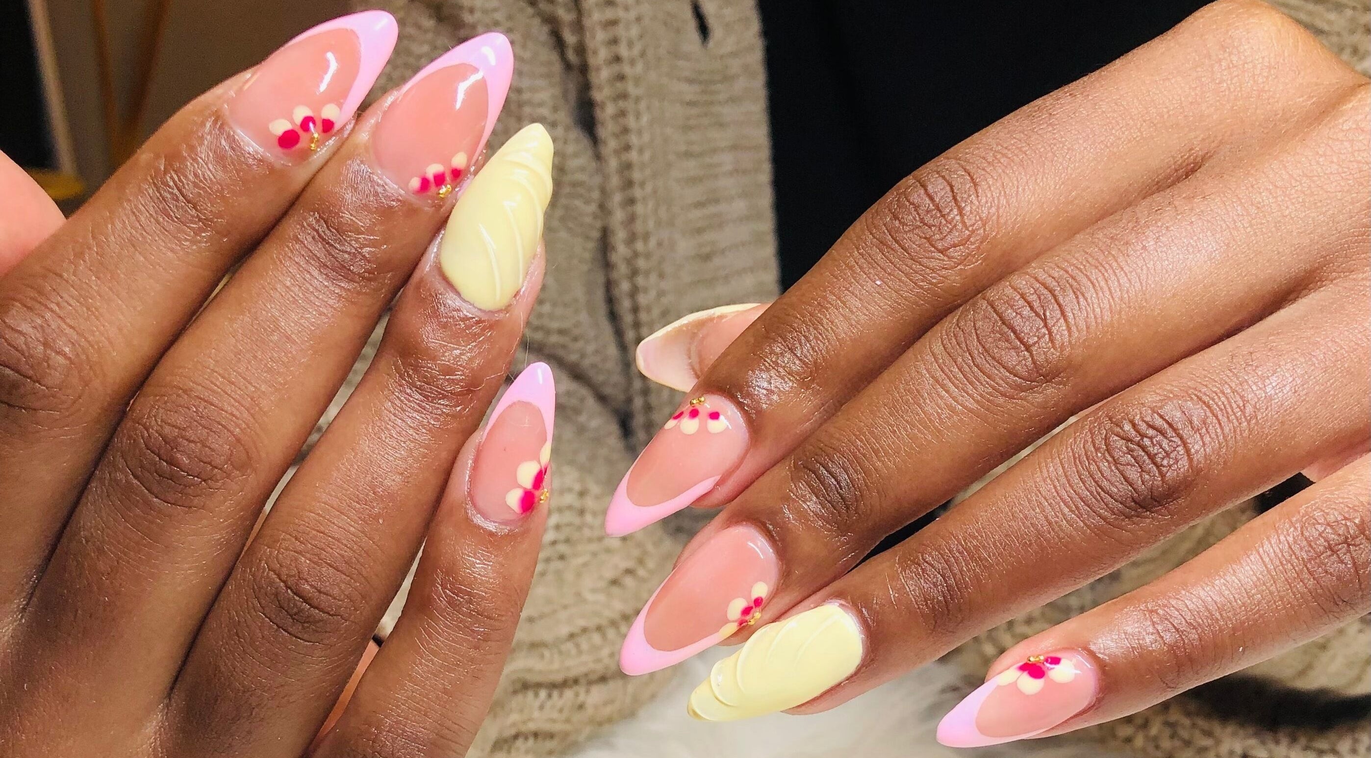 Elegant floral nail art by Nailed by Mandy in Katlehong, Gauteng, ZA showcasing intricate pink and yellow designs.