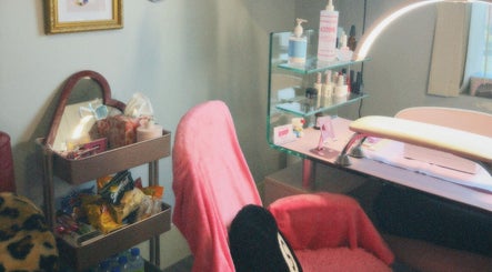 Cozy nail station at Thatyana’s Nail Place in St. Catharines, Ontario, CA featuring chic decor and products.