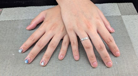 Stylish nails with nail art at Starz & Knyvz Nails, Beaconsfield, England, GB.