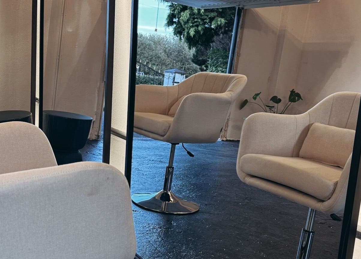 Modern beige salon chairs at Salon LOTI, Newry, Northern Ireland, GB creating a cozy, stylish setting.