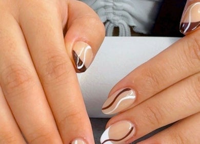 Chic nail art design at Nail by Alin, Clydebank, Scotland, GB, featuring brown and white abstract patterns.
