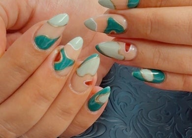 Stylish abstract nail art in green and cream at Nail by Alin, Clydebank, Scotland, GB.