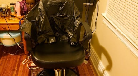 Styling chair at Lady Chic, Rochester, New York, US, with beauty tools, showcasing professional salon environment.