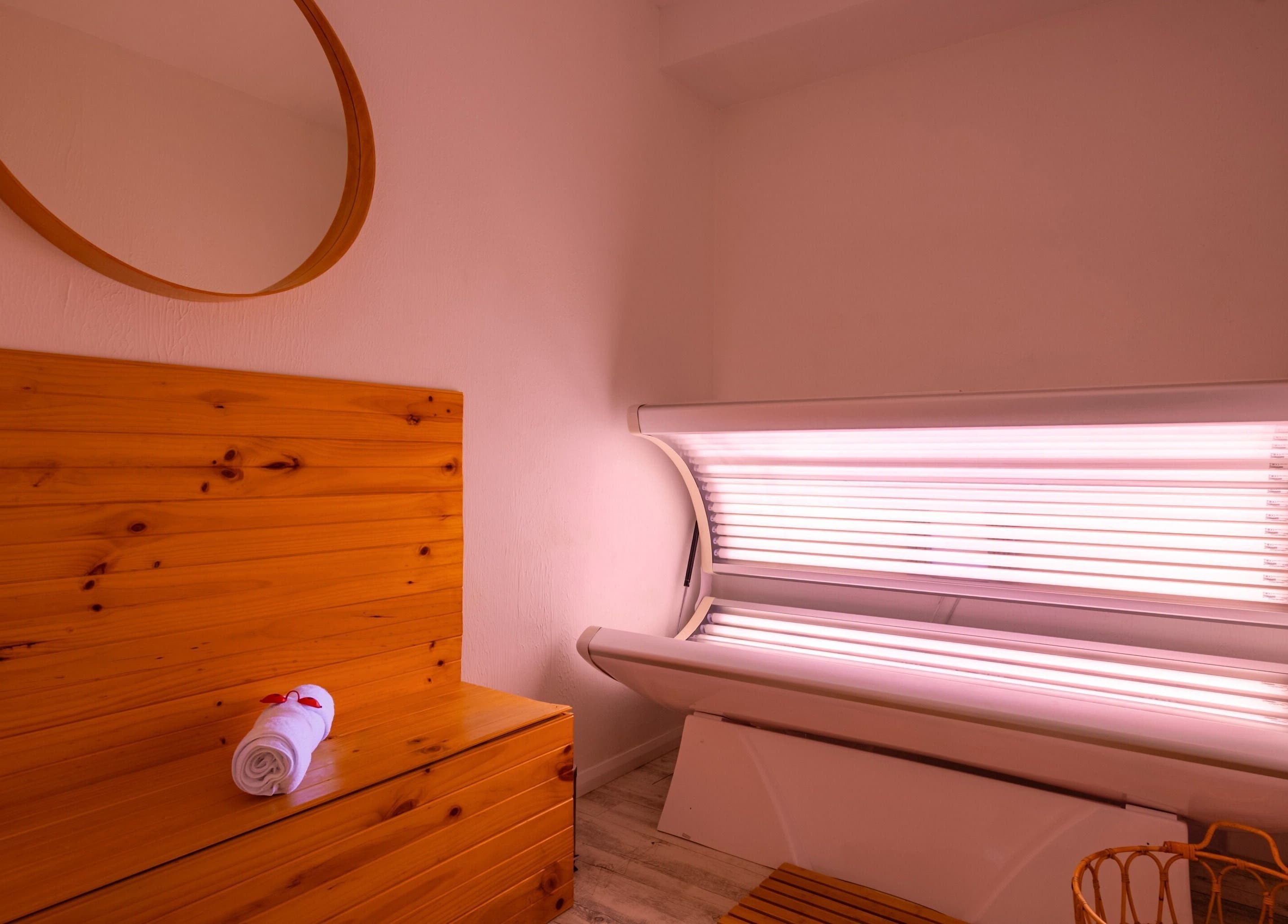 Tanning bed in cozy wooden room at Halo Sanctuary, Ramsgate, New South Wales, AU.