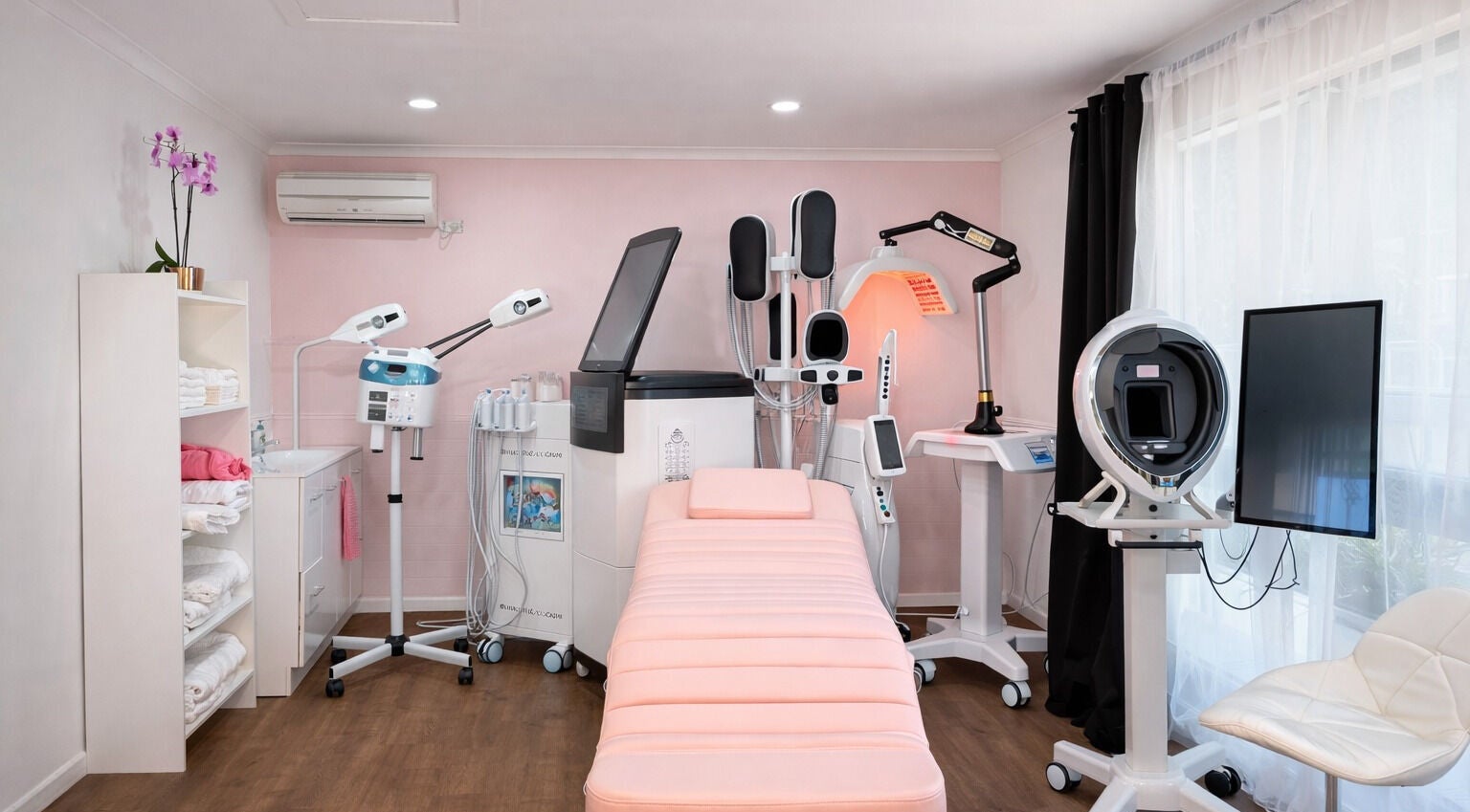 Modern spa room at Realm of Beauty by Lour, Springwood, Queensland, AU, featuring advanced treatment equipment.