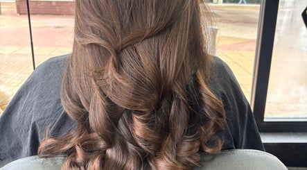 Beautiful curled hairstyle at Ericarichardsonhair, Hornchurch, England, GB, showcasing professional hair styling.