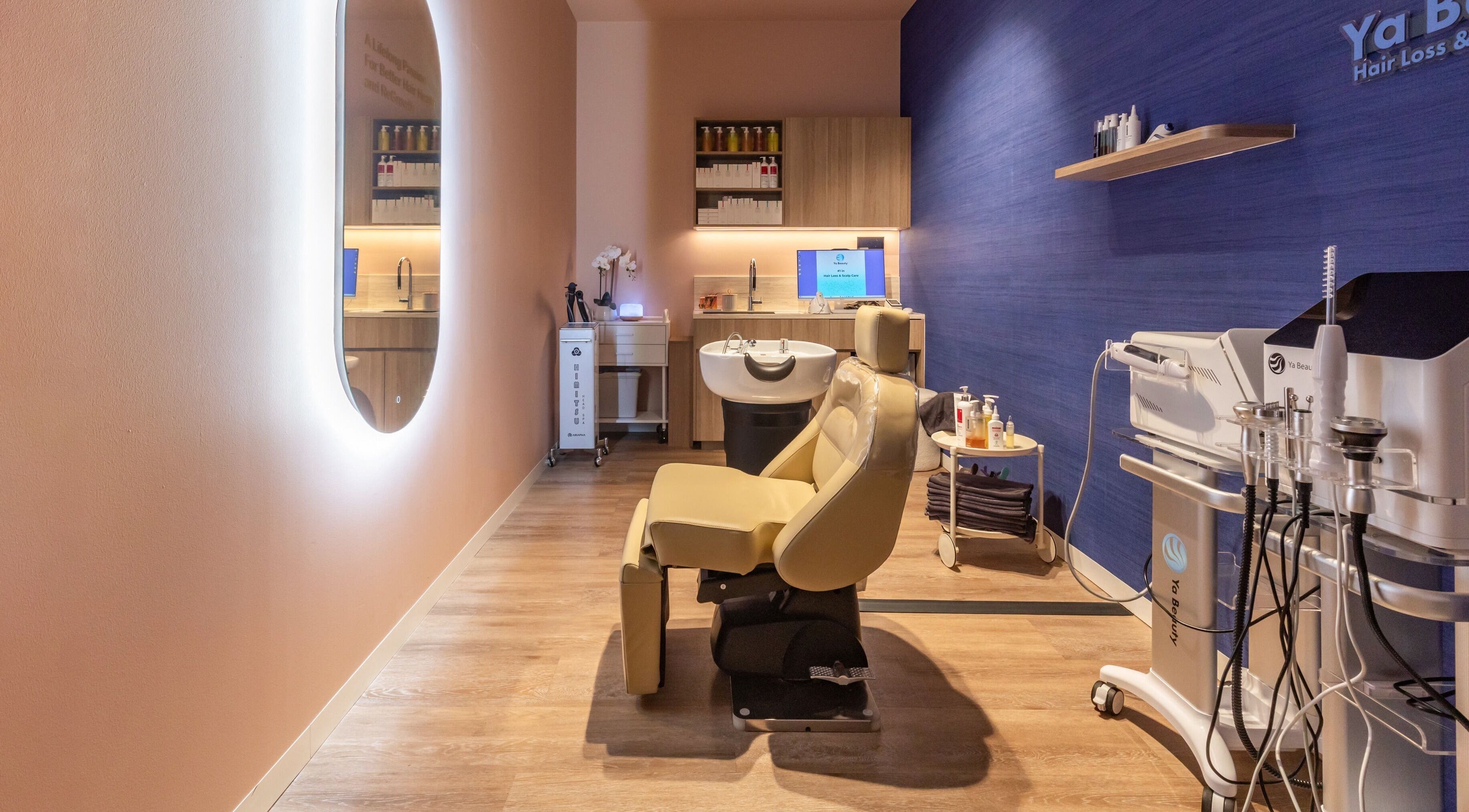 Relaxing treatment room at Ya Beauty | St Leonards, showcasing luxury spa chair and modern decor in New South Wales, AU.