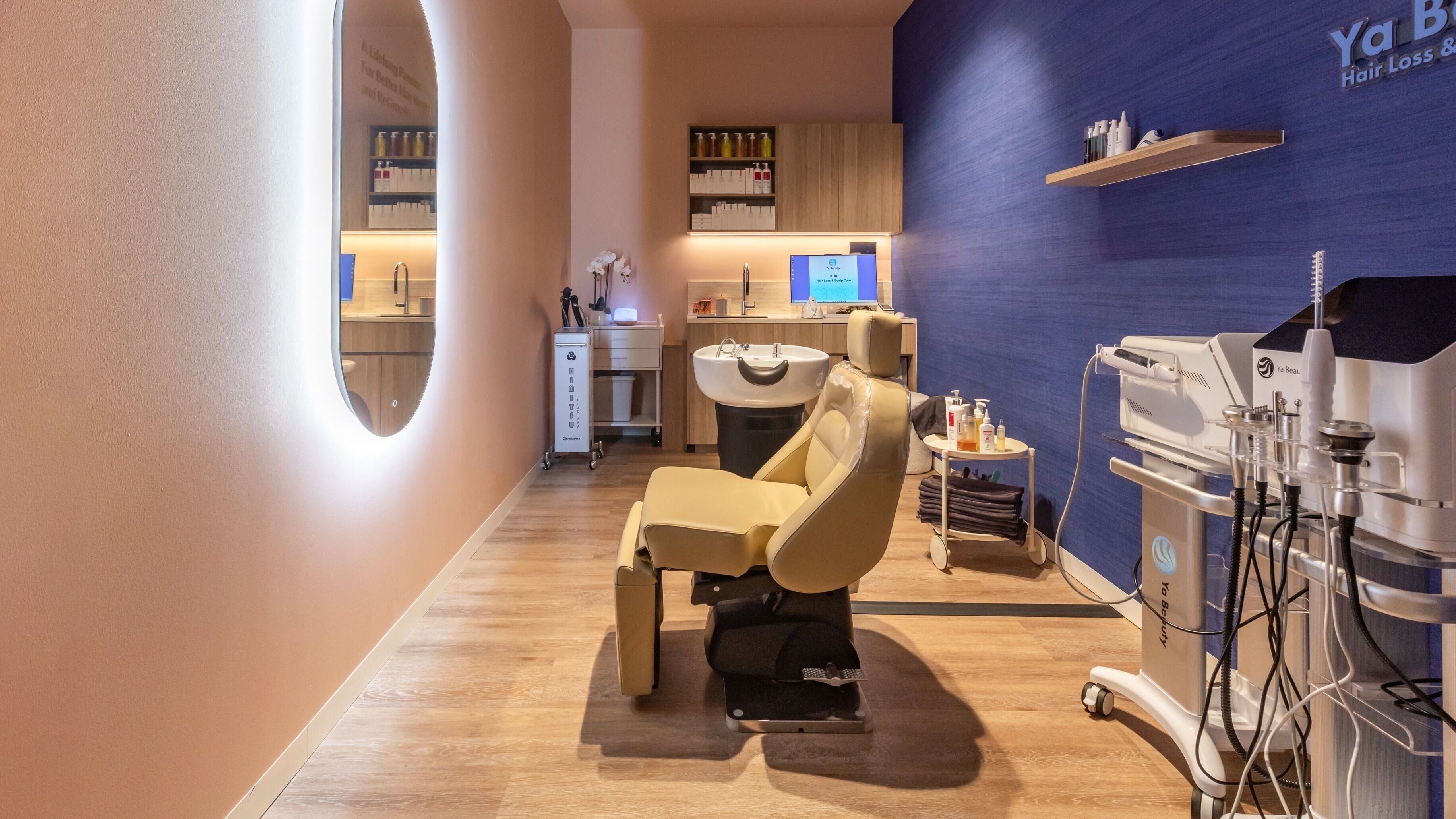 Relaxing treatment room at Ya Beauty | St Leonards, showcasing luxury spa chair and modern decor in New South Wales, AU.