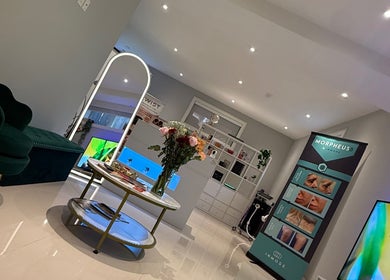 Chic lounge at Serendipity Pro Inc, Richmond Hill, Ontario, CA, featuring modern decor and treatment displays.