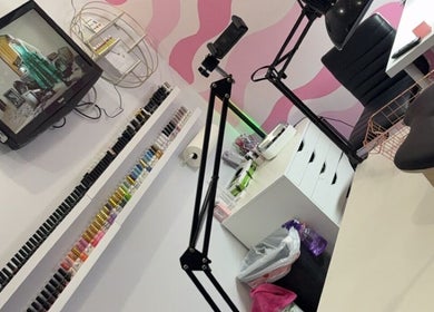 Spacious beauty setup at NailsBy.aa, Hamilton, Ontario, CA, with vibrant nail polish display and modern decor.