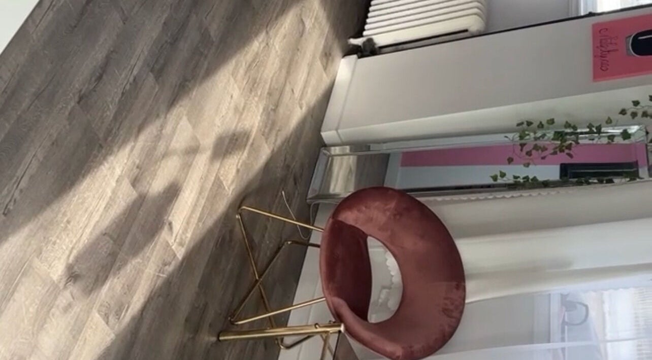 Elegant chair at NailsBy.aa in Hamilton, Ontario, CA, showcasing modern salon ambiance.