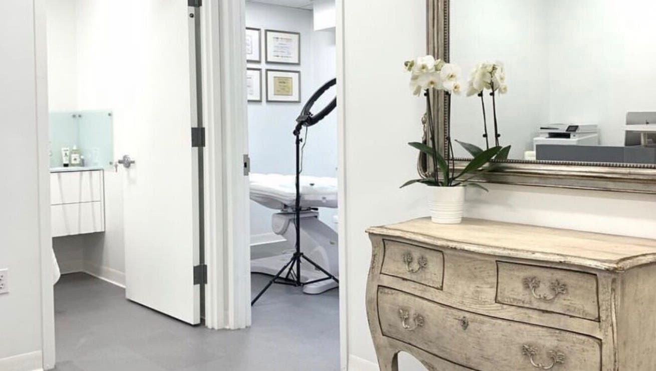 Elegant treatment room at Aesthetinks Wellness Studio, Riverview, Florida, US, with decor and professional setup.