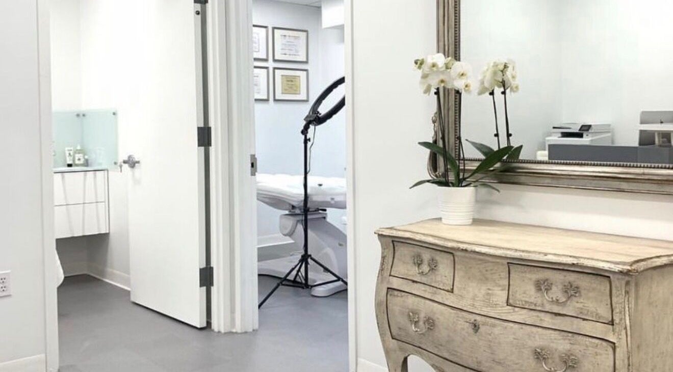 Elegant treatment room at Aesthetinks Wellness Studio, Riverview, Florida, US, with decor and professional setup.