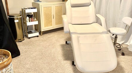 Luxurious treatment chair at Aesthetinks Wellness Studio, Riverview, Florida, US, offering a relaxing environment.