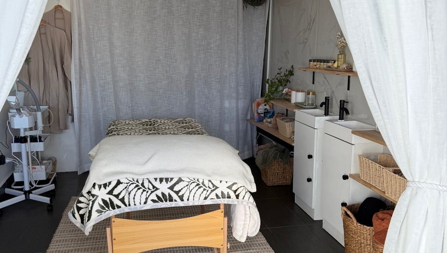 Tranquil massage room at Nothin Knotty, Kogarah, New South Wales, AU with cozy decor and massage table.