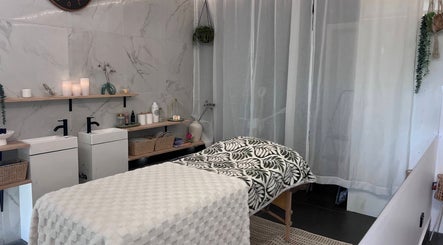Calm massage room at Nothin Knotty, Kogarah, New South Wales, AU with cozy decor and relaxing ambiance.